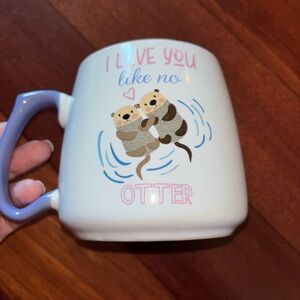 Cute Otter Mug with Blue Handle